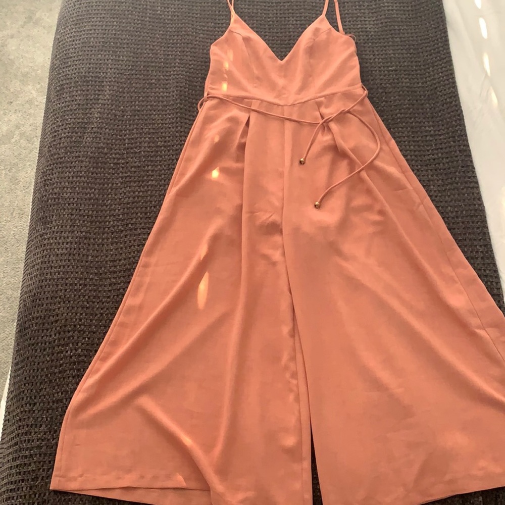 Pink jump suit